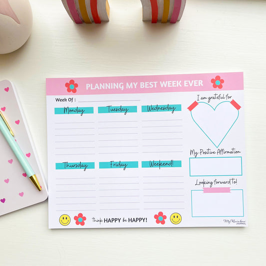 Best week ever planner pad flat lay with white background