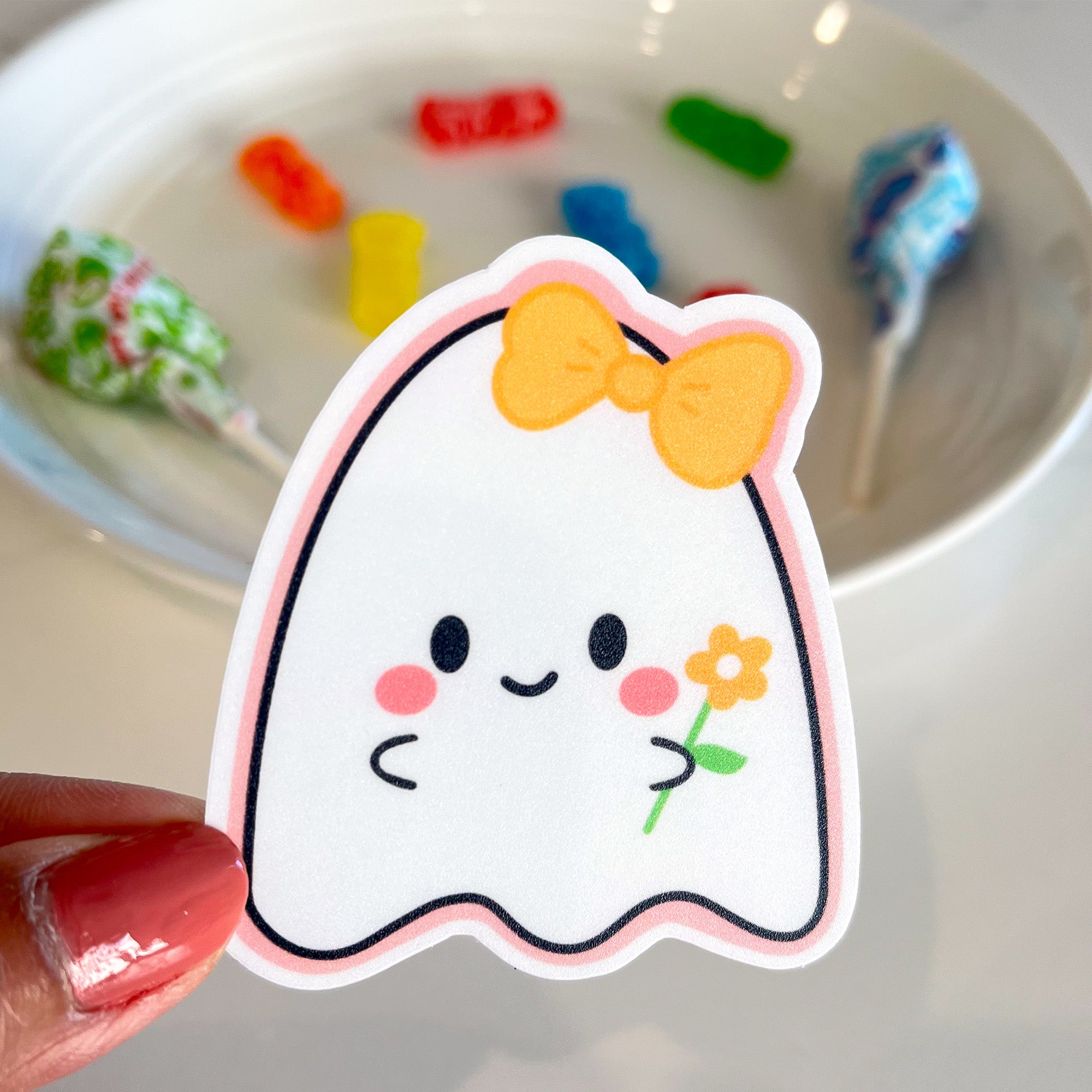Floral ghost sticker with candy background