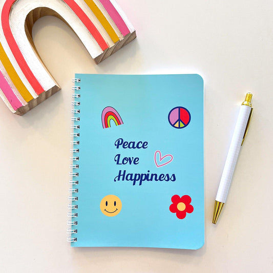 Peace Love Happiness notebook flat lay