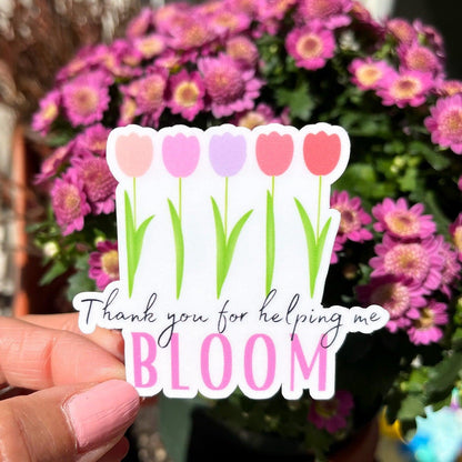Bloom sticker outside with flower backdrop