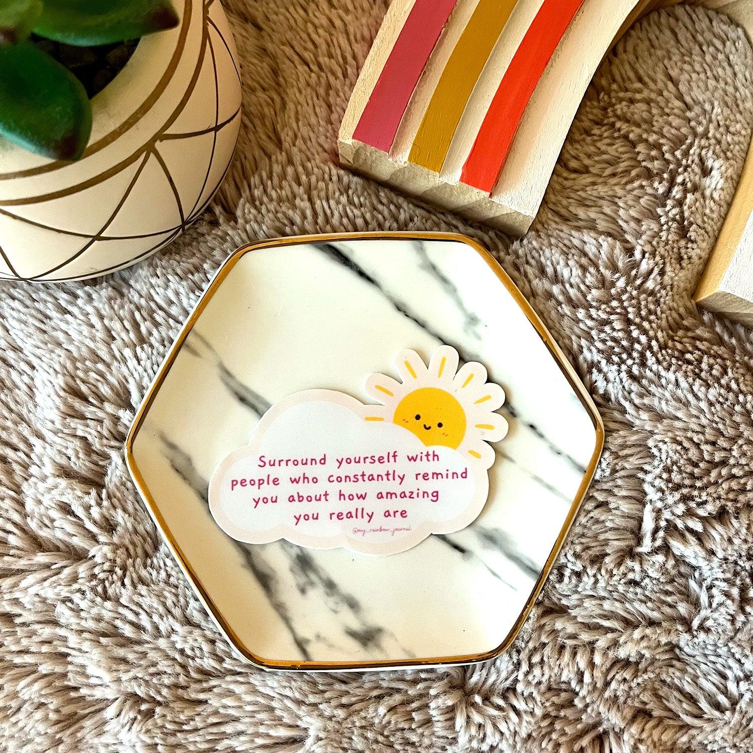 Positive sun sticker inside displayed on a dish