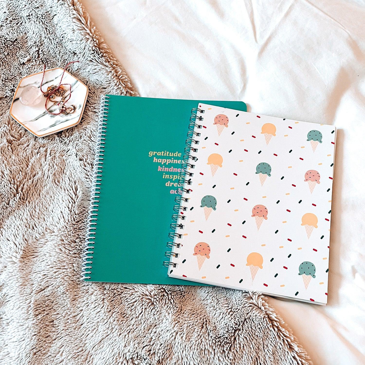 Ice cream with sprinkles journal flat lay on bed